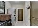Practical laundry area featuring stacked washer/dryer, storage, and neutral tones for a clean and organized feel at 3163 Neal Ct, Cumming, GA 30041