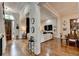 Open-concept interior showcasing the entry hall, living area and dining room at 3163 Neal Ct, Cumming, GA 30041