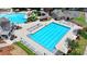 Resort-style community swimming pool with slide, covered picnic area, and ample seating at 3163 Neal Ct, Cumming, GA 30041