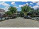 Beautiful street view with lush greenery, mature trees, and seating at 3163 Neal Ct, Cumming, GA 30041