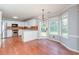 Bright kitchen with stainless steel appliances, white cabinetry, and breakfast nook at 3554 Cherry Blossom Court, Loganville, GA 30052