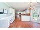 Eat-in kitchen with stainless steel appliances, desk area, and access to backyard at 3554 Cherry Blossom Court, Loganville, GA 30052