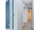 Hallway with carpeted floor leading to additional rooms at 3554 Cherry Blossom Ct, Loganville, GA 30052