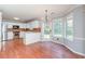 Kitchen features stainless steel appliances, white countertops, and a window overlooking the backyard at 3554 Cherry Blossom Ct, Loganville, GA 30052