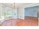 Eat-in kitchen with hardwood floors and a walk-out to the yard at 3554 Cherry Blossom Ct, Loganville, GA 30052