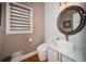 Modern bathroom features a sleek vessel sink, unique fixtures, and a contemporary design at 2521 Wood Creek Ct, Dacula, GA 30019