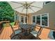Outdoor deck with table and chairs, ideal for relaxing or entertaining at 2521 Wood Creek Ct, Dacula, GA 30019
