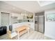 Bright kitchen with stainless steel appliances, quartz counters, mosaic tile backsplash, and vinyl floors at 2521 Wood Creek Ct, Dacula, GA 30019
