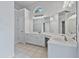 Bathroom with a large vanity area, well-lit mirrors and double sink at 2934 Mill Grove Ter, Dacula, GA 30019