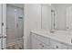 Bathroom featuring new tiled shower, modern vanity and fixtures at 2934 Mill Grove Ter, Dacula, GA 30019
