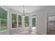 Cozy breakfast nook featuring natural light, hardwood floors, and backyard views at 2934 Mill Grove Ter, Dacula, GA 30019