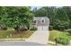 Beautiful two-story brick home with a well-manicured lawn and a two-car garage at 2934 Mill Grove Ter, Dacula, GA 30019