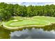 Picturesque golf course with water feature and manicured green at 2934 Mill Grove Ter, Dacula, GA 30019