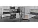 Updated kitchen featuring stainless steel appliances and granite countertops at 2934 Mill Grove Ter, Dacula, GA 30019