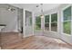Spacious living area with hardwood floors, natural light, and backyard views at 2934 Mill Grove Ter, Dacula, GA 30019