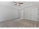Main bedroom with carpet and ensuite bathroom at 2934 Mill Grove Ter, Dacula, GA 30019