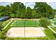 Aerial view of a community recreational area with a basketball court and beach volleyball court at 2934 Mill Grove Ter, Dacula, GA 30019