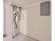 Unfinished basement area with white concrete walls and tiled floors at 3812 Clare Ct, Duluth, GA 30096