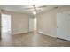 Bedroom showcases wood floors, light-colored walls, and bathroom access at 3812 Clare Ct, Duluth, GA 30096
