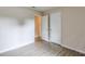 Bedroom featuring wood floors, light-colored walls, and closets at 3812 Clare Ct, Duluth, GA 30096