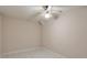 A small room with ceramic tile flooring and a ceiling fan at 3812 Clare Ct, Duluth, GA 30096
