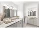 Bright bathroom with granite countertops and white cabinets at 4070 Whitewater Creek Rd, Atlanta, GA 30327
