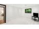 Bright bonus room featuring recessed lights, a large window and new carpet at 4070 Whitewater Creek Rd, Atlanta, GA 30327