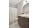 Modern bathroom featuring a sink, vanity, and shower, creating a clean and functional space for everyday use at 904 Urban Ash Ct, Johns Creek, GA 30022