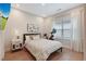 Comfortable bedroom with a cozy bed and neutral decor, creating a soothing space for rest and relaxation at 904 Urban Ash Ct, Johns Creek, GA 30022