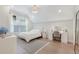 Charming bedroom with a bed, vanity and decor, creating a relaxing and inviting space for rest and rejuvenation at 904 Urban Ash Ct, Johns Creek, GA 30022