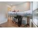 Bright living room showcasing a window with blinds and a gaming setup, making it ideal for work or play at 904 Urban Ash Ct, Johns Creek, GA 30022
