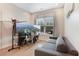 Comfortable living room featuring a sofa and a window, creating a cozy space for relaxation and entertainment at 904 Urban Ash Ct, Johns Creek, GA 30022