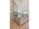 Spacious living room with a vaulted ceiling, fireplace, built-in shelving, and lots of natural light at 904 Urban Ash Ct, Johns Creek, GA 30022