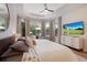 Spacious main bedroom featuring neutral decor and a large window at 904 Urban Ash Ct, Johns Creek, GA 30022