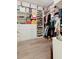 Spacious walk-in closet with custom shelving and storage solutions, perfect for organizing clothes and accessories at 904 Urban Ash Ct, Johns Creek, GA 30022