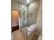 This bathroom features a glass-enclosed shower with a rain showerhead and a built-in niche at 1460 Hartford Sw Ave, Atlanta, GA 30310