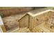 View from a wood deck with natural wood railing and view of a small backyard at 1460 Hartford Sw Ave, Atlanta, GA 30310