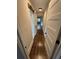 Hallway featuring hardwood floors, a barn door, and recessed lighting at 1460 Hartford Sw Ave, Atlanta, GA 30310