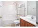 Bathroom includes a shower and bathtub, with storage shelving to keep things organized and functional at 4350 Annlette Dr, Lawrenceville, GA 30044
