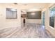 Dining room showcasing hardwood floors, stylish chandelier, neutral paint, and ample natural light at 4350 Annlette Dr, Lawrenceville, GA 30044