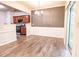 Bright dining area with hardwood floors, elegant chandelier, and direct access to the kitchen at 4350 Annlette Dr, Lawrenceville, GA 30044