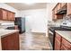 Well-equipped kitchen featuring stainless steel appliances, wood cabinets, and granite countertops at 4350 Annlette Dr, Lawrenceville, GA 30044