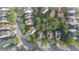 An aerial view of a suburban neighborhood with tree-lined streets and various residential homes at 4350 Annlette Dr, Lawrenceville, GA 30044