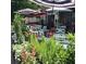 Charming outdoor seating area with umbrellas and lush greenery, perfect for relaxing and dining al fresco at 511 Casanova Se St, Atlanta, GA 30315