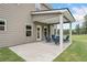 Covered patio with outdoor furniture, perfect for relaxation and entertaining in the backyard at 31 Village Trce, Rydal, GA 30171