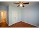 A bright bedroom offers a closet and bathroom access, perfect for guests or Gathering at 6865 Cowan Mill Rd, Winston, GA 30187
