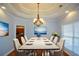 Elegant dining room featuring decor and a dining set for a staged showing at 6865 Cowan Mill Rd, Winston, GA 30187
