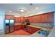Spacious kitchen with stainless steel appliances, ample cabinet space, and hardwood floors at 6865 Cowan Mill Rd, Winston, GA 30187