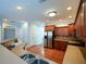 Open concept kitchen featuring stainless steel appliances and hardwood floors at 6865 Cowan Mill Rd, Winston, GA 30187