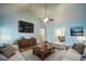 Inviting living room featuring wood floors, vaulted ceilings, and natural light; perfect for relaxation at 6865 Cowan Mill Rd, Winston, GA 30187